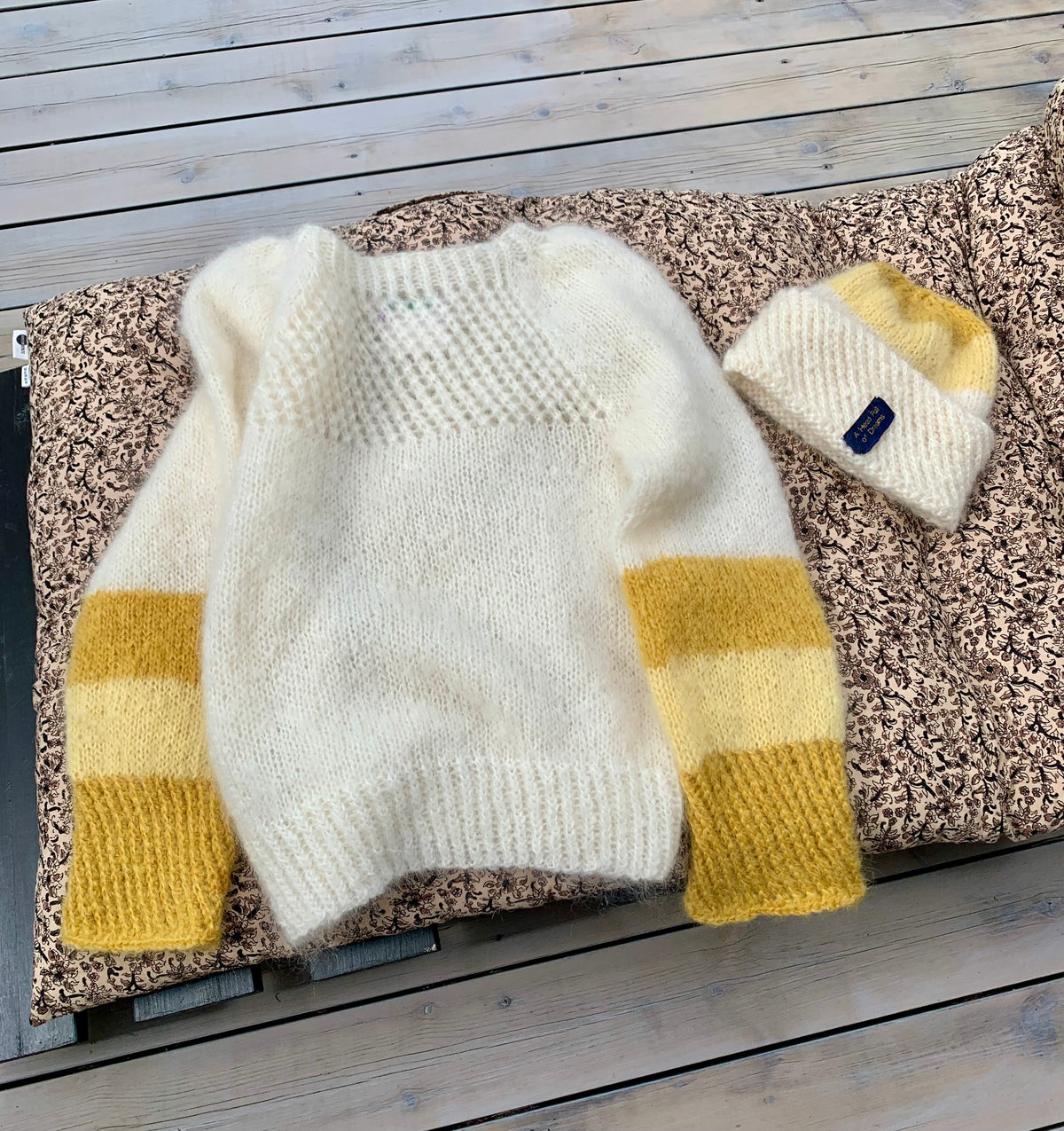 Natural-coloured mohair sweater with sun yellow striped sleeves and lace knitting – Here Comes the Sun from CosyMonday