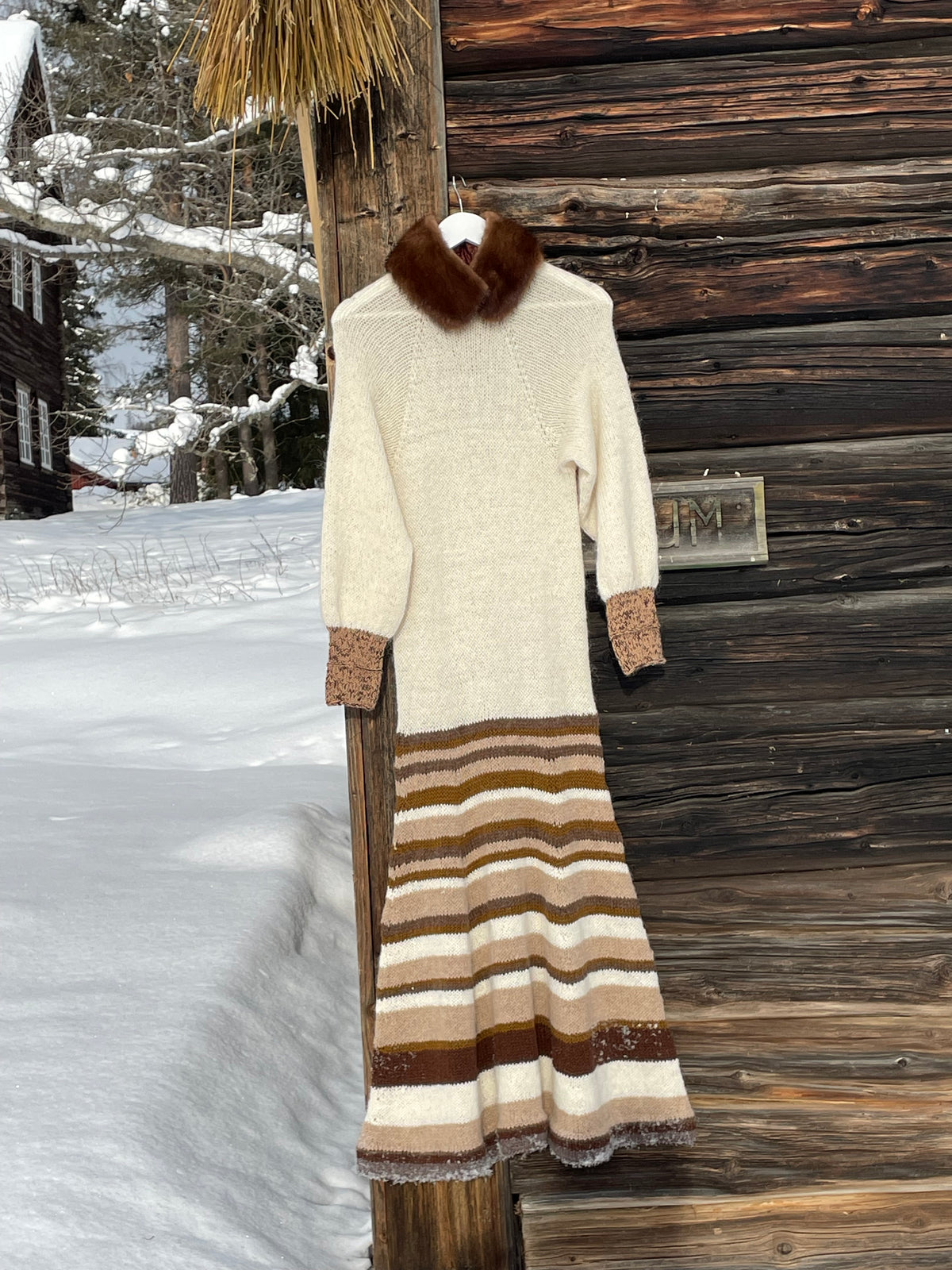 Retro-inspired knitted dress with a flared skirt and long cuffs – Unsaid from CosyMonday