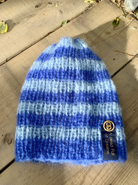 Hand-knitted striped rib hat in blue mohair with a slouch at the back – Striped Sky from CosyMonday